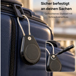 AirTag-Halter mit Stahlseil am Griff eines Koffers